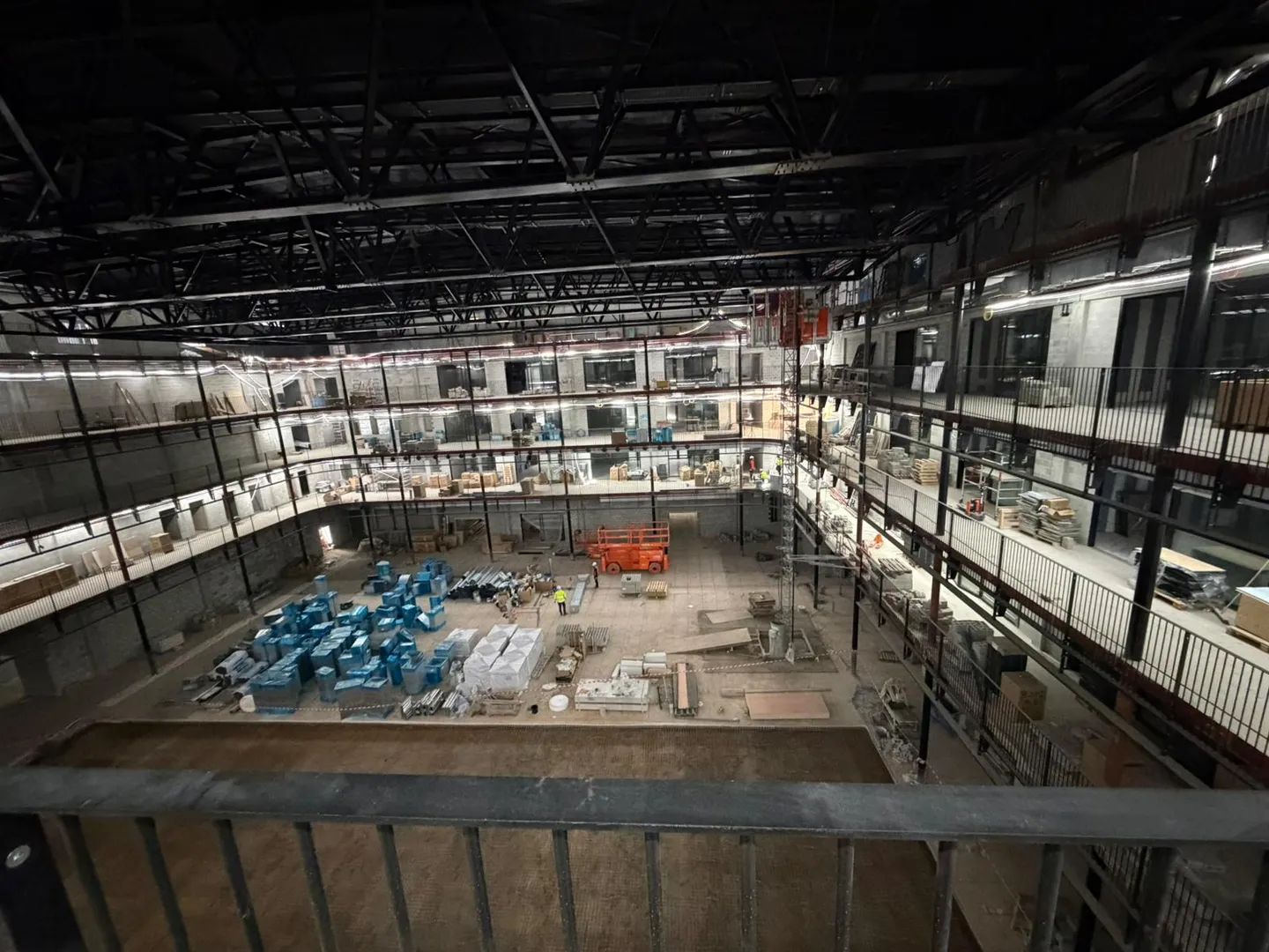 Large industrial hall with installation equipment and materials